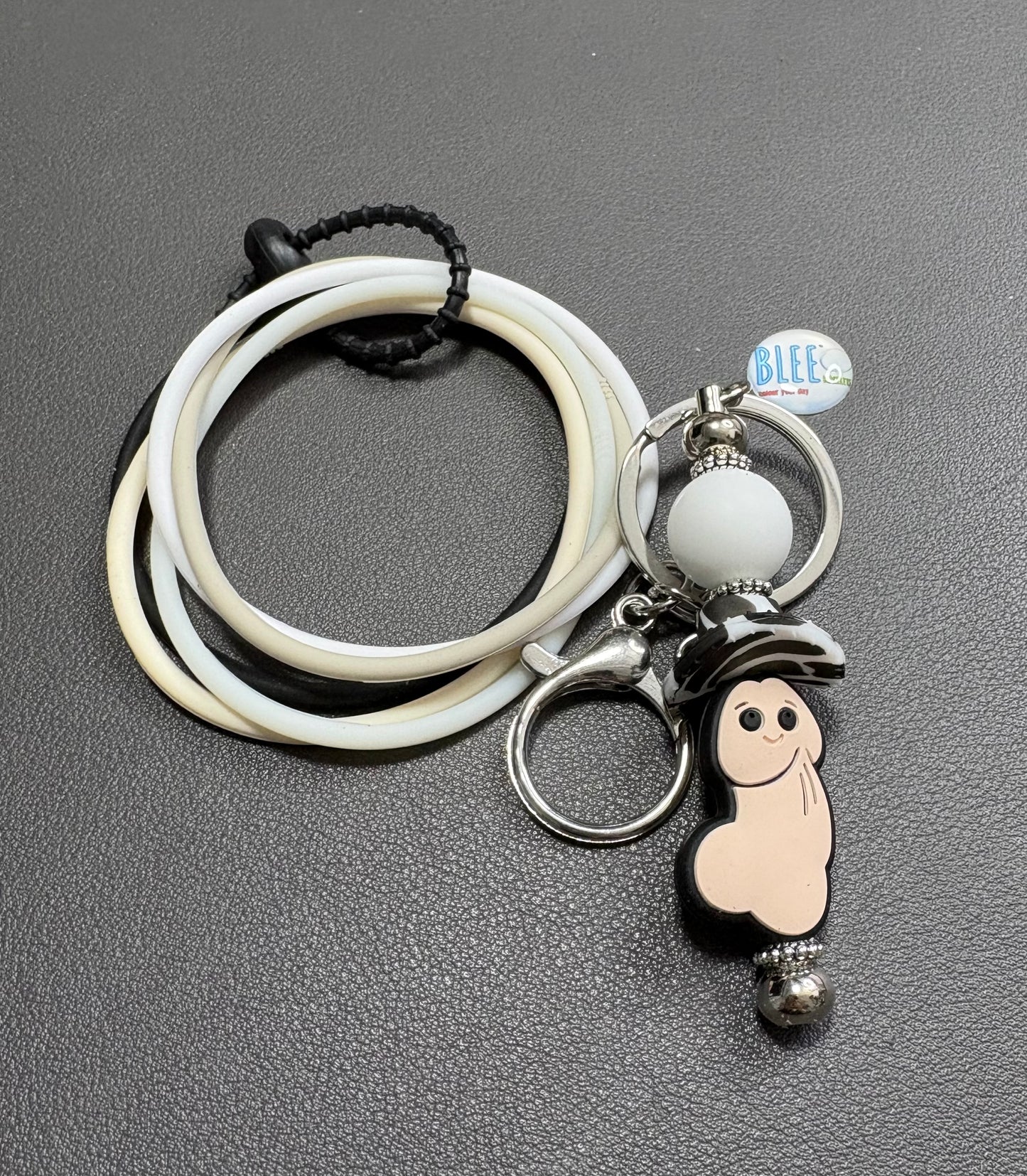BLEE mini flight with Elmer the penis/cowboy hat keychain