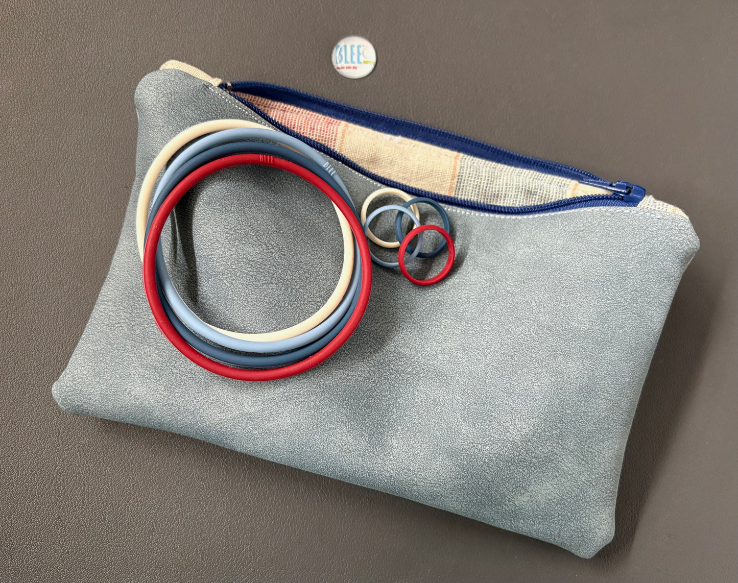 BLEE mini flight faux suede pouch