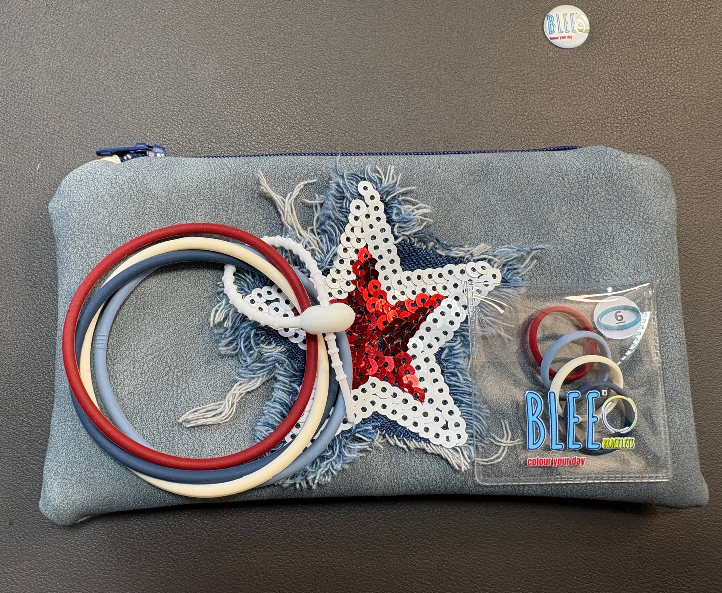 BLEE mini flight faux suede pouch with sequin star