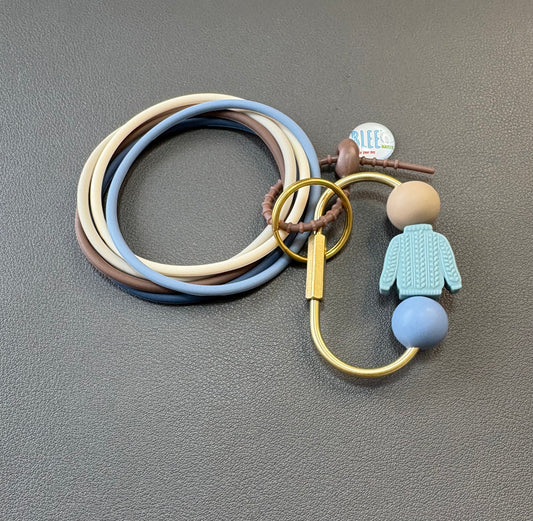 BLEE collection with sweater weather carabiner keychain.