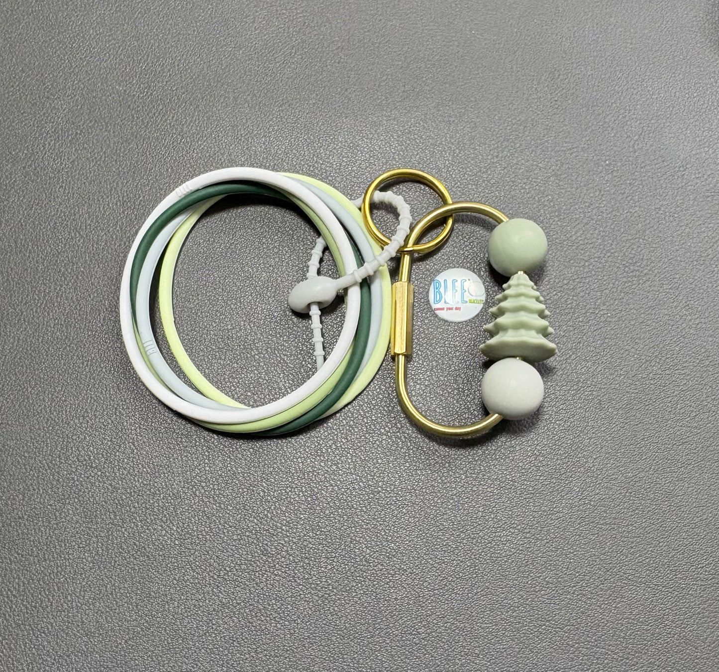 BLEE collection with silicone tree bead brass colour carabiner keychain.