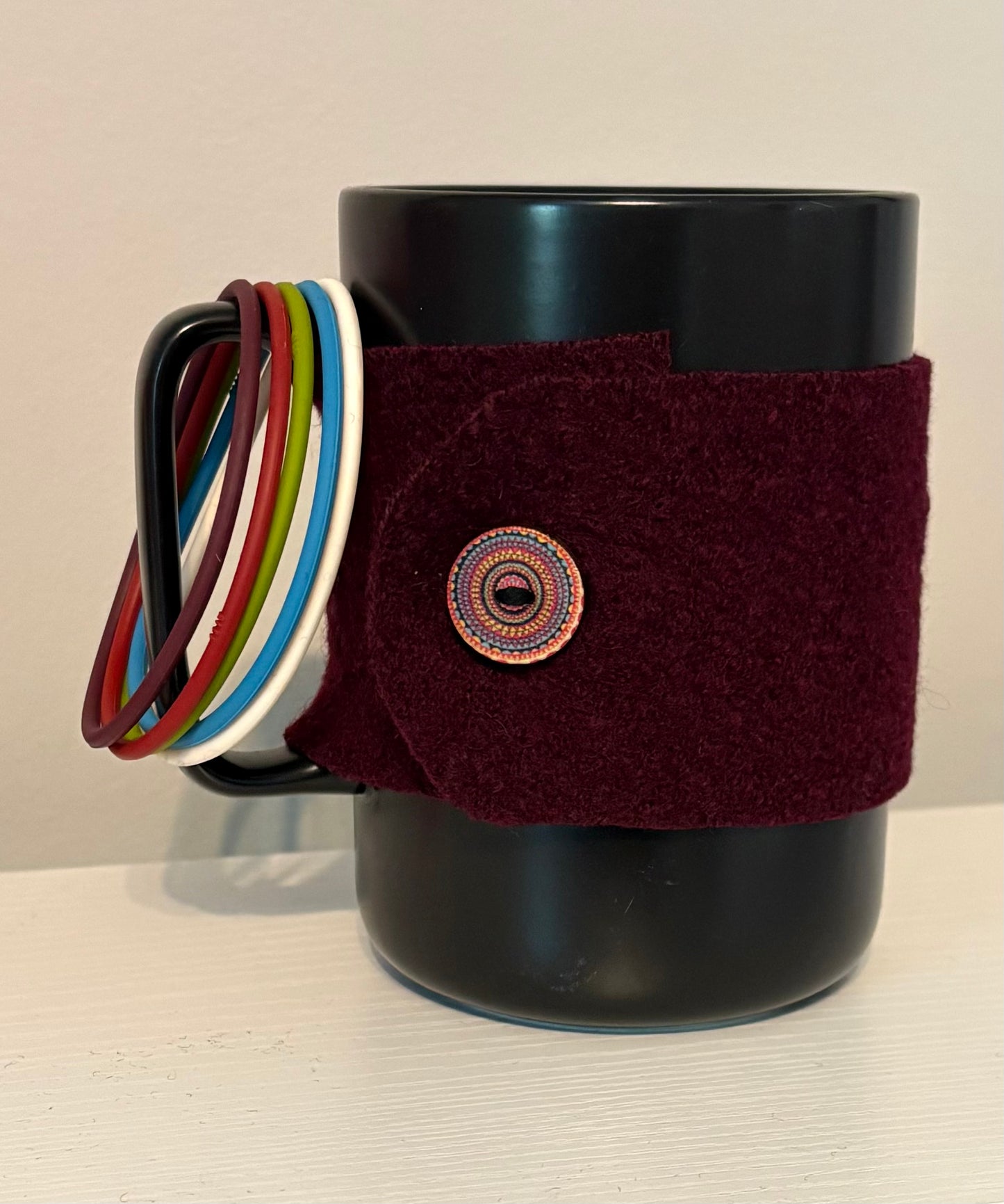 Home made wool mug cozy with matching 5pc bracelet collection