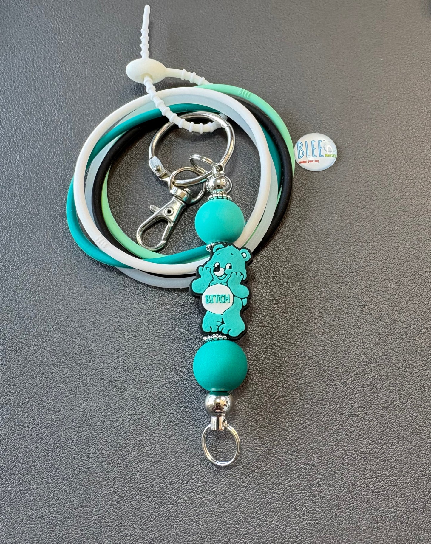 BLEE mini flight with CARE BEAR (BITCH) keychain