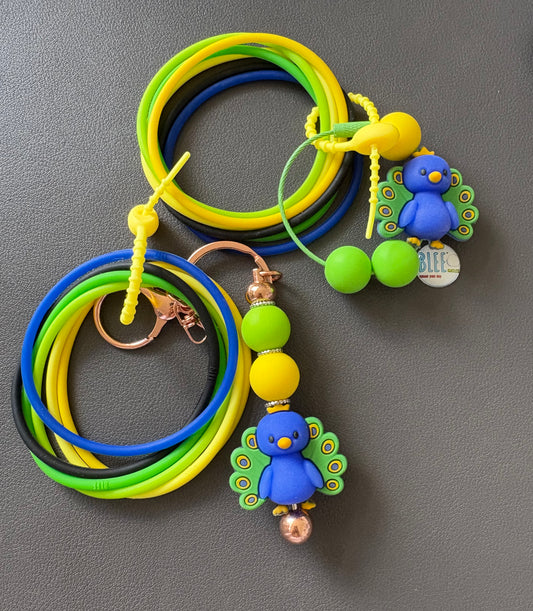 BLEE MINI FLIGHT WITH A PEACOCK KEYCHAIN
