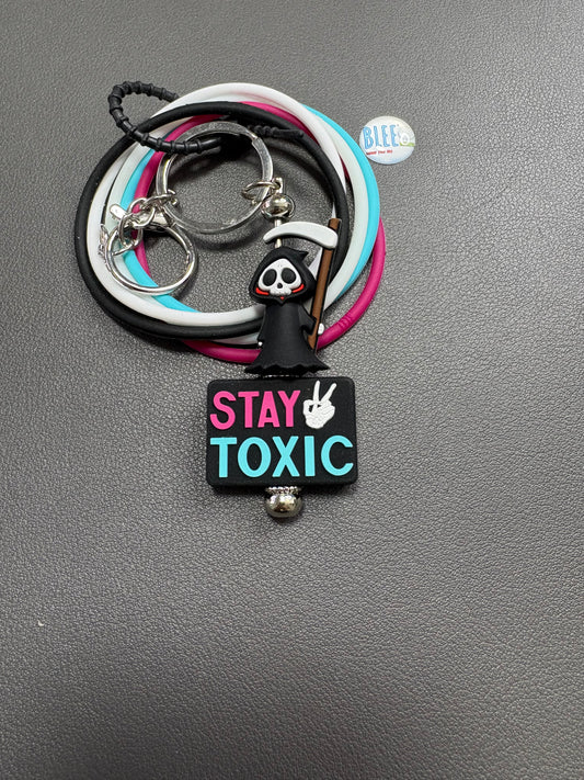 BLEE mini flight with grim reaper/stay toxic keychain